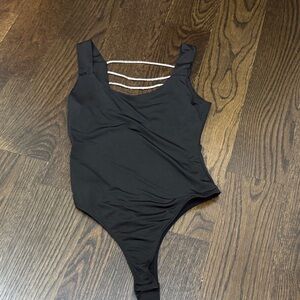 Black Bodysuit with rhinestone straps Detail from buckle